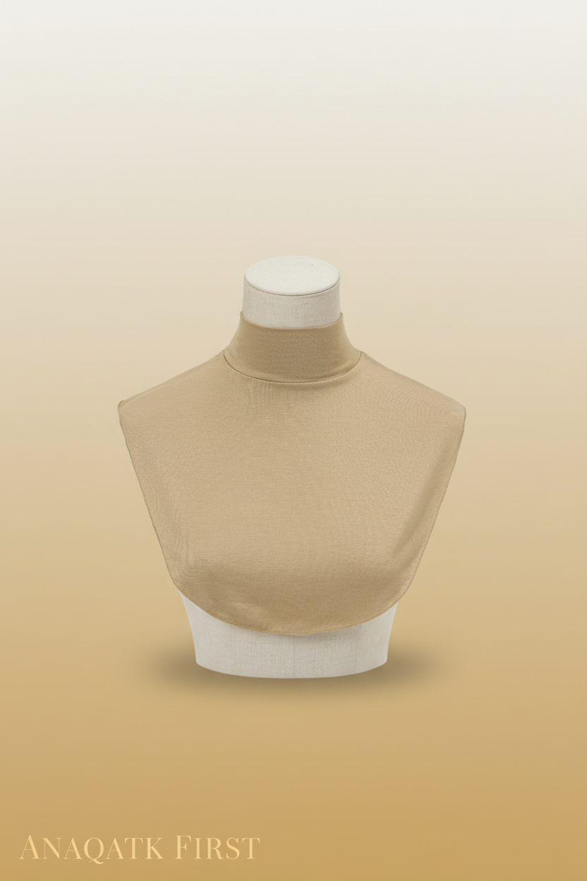 Beige turtleneck sweater on a mannequin with a plain background