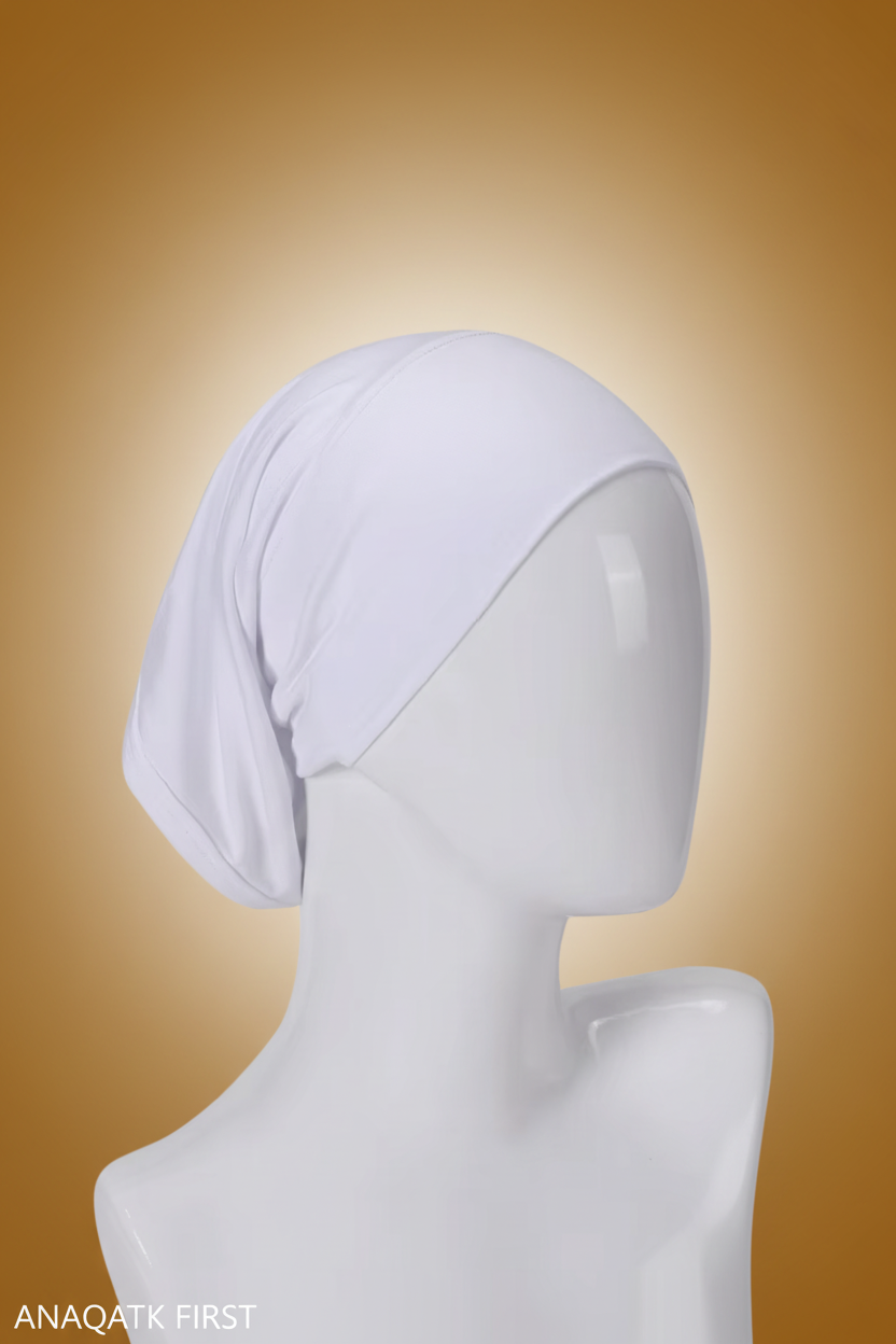White headscarf on a mannequin head against a white background