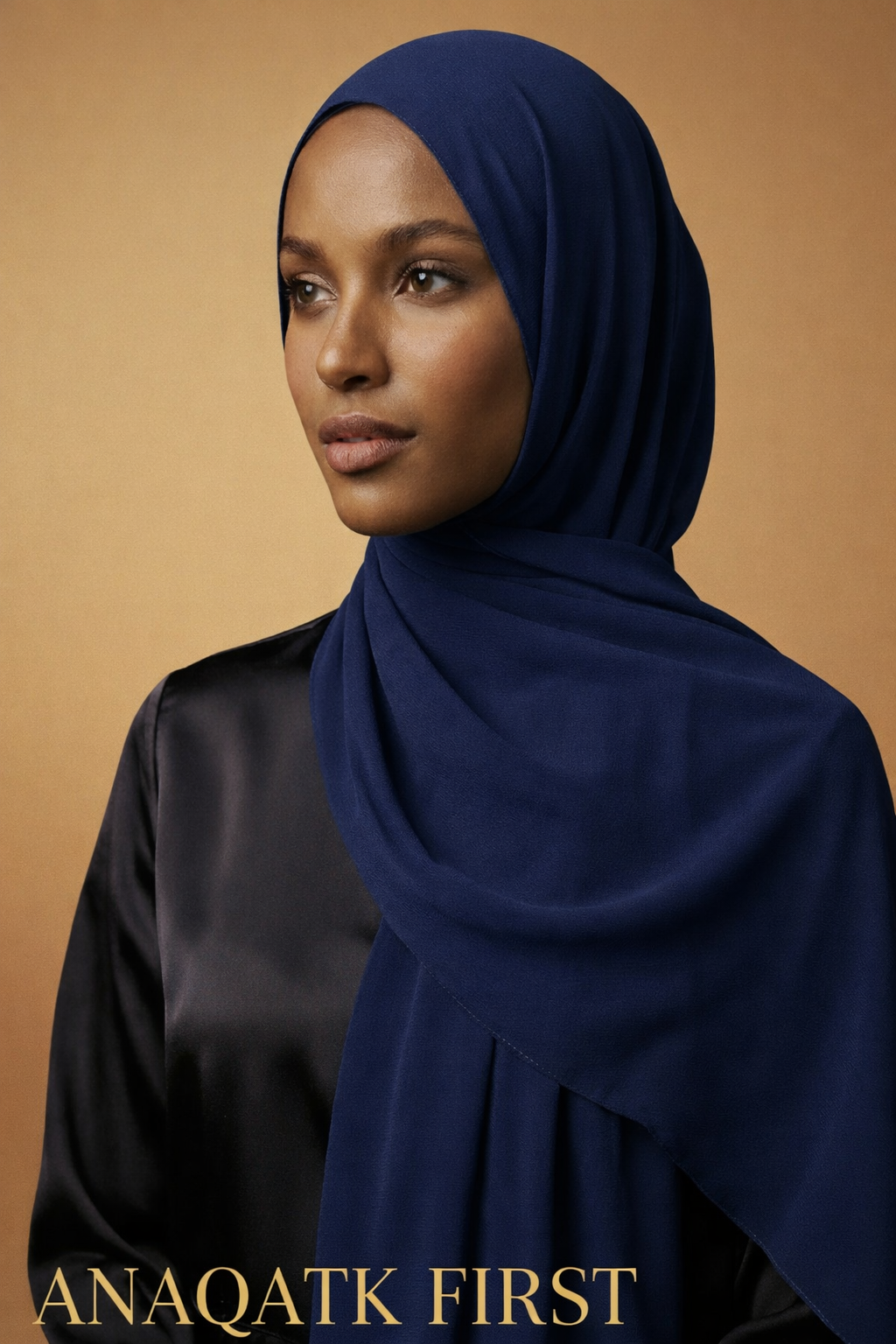 Woman wearing navy hijab — ANAQATK FIRST